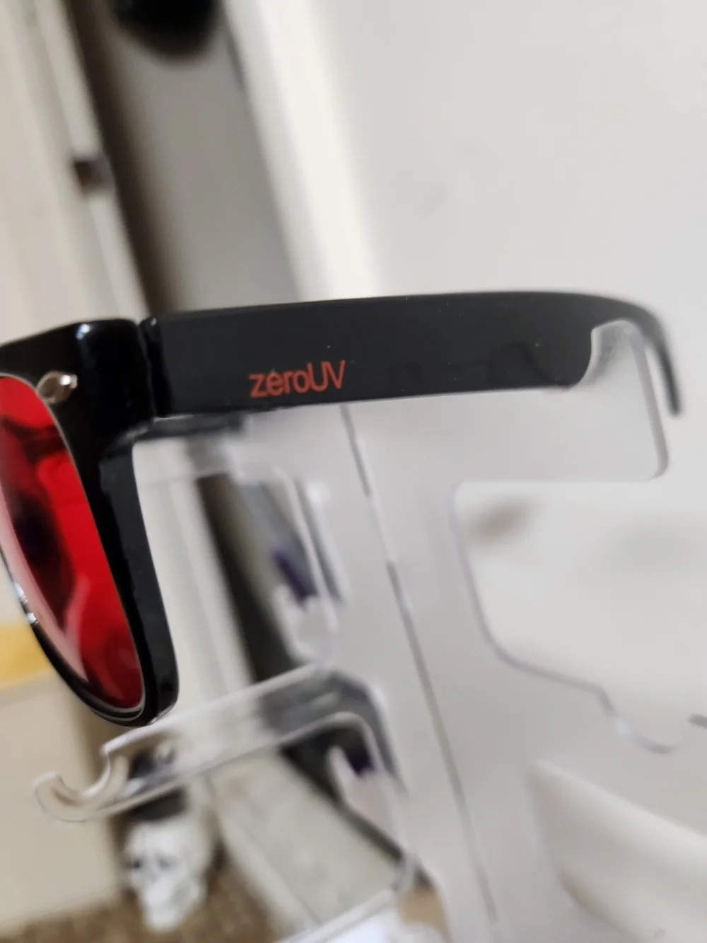 Source Unknown Black Sunglasses with Red Lenses